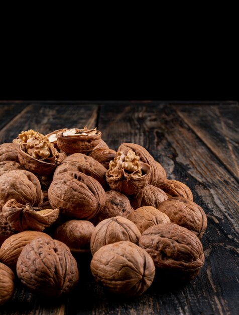 Close-up walnuts on wooden vertical