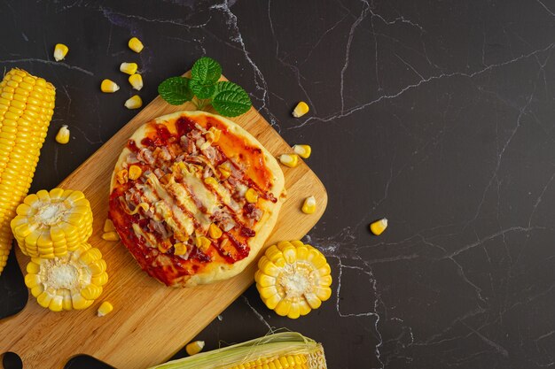 Close up on warm corn pizza ready to eat