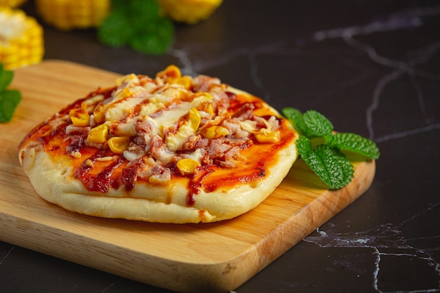 Close up on warm corn pizza ready to eat