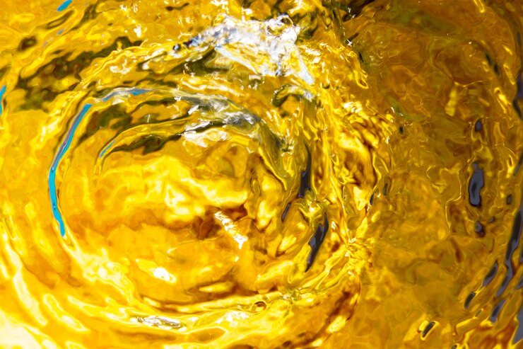 Free Photo close-up water rings on a yellow pool surface