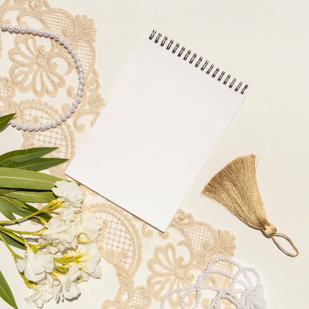Close-up wedding arrangement with notepad 