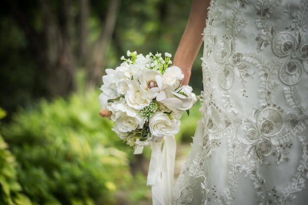 Close up of wedding bridal bouquet in bride hand.