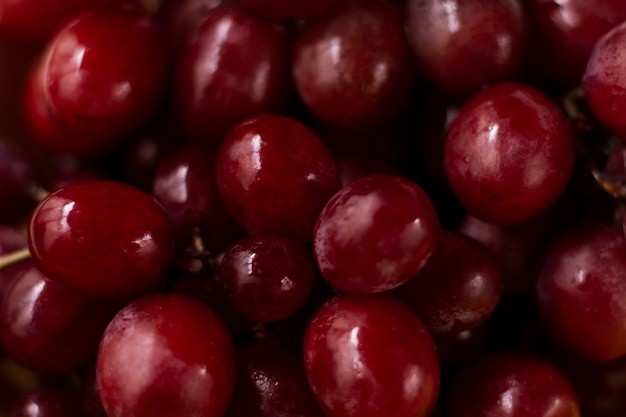 Close up wet red grapes