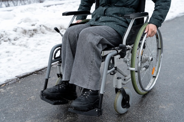 Close up on wheelchair of disabled person