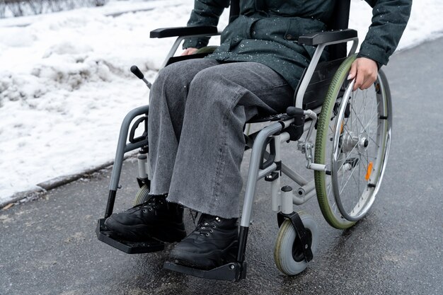 Close up on wheelchair of disabled person