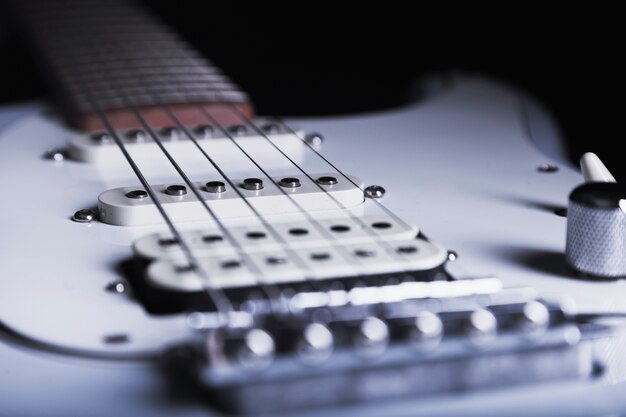 Close-up white guitar
