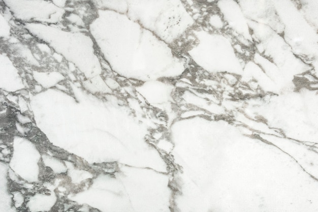 Free photo close up of a white marble textured wall