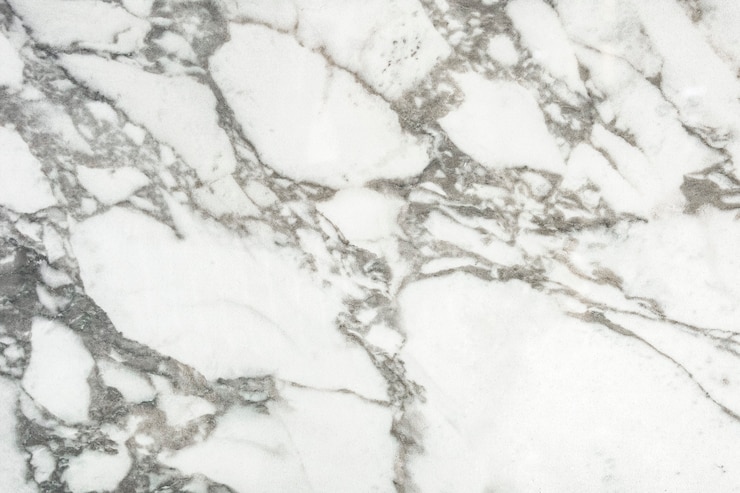 Free Photo close up of a white marble textured wall