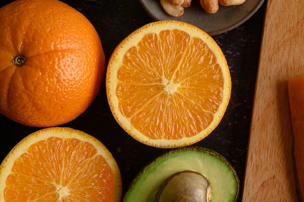 Close up with Slice of fresh orange and avocado.