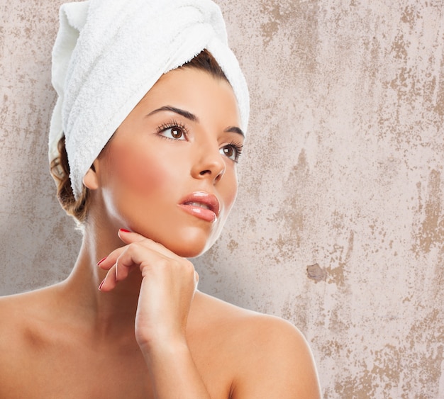 Close-up of woman after bath in towel