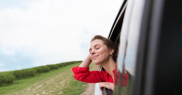 Close-up woman in car