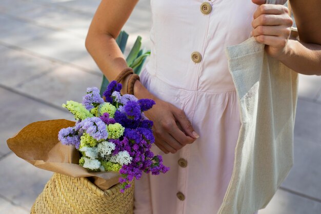 Close up woman carrying bag