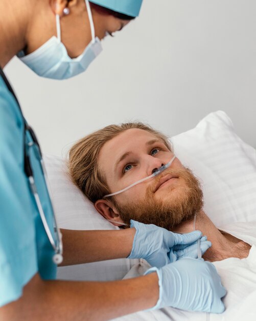 Close up woman checking patient