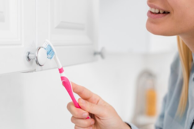 Close-up woman cleaning closets