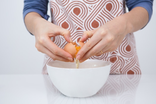 Close-up of woman cooking favorite dessert