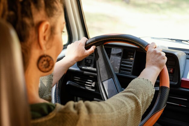 Close up woman driving