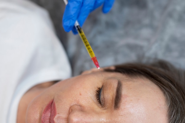 Close up woman getting prp injection