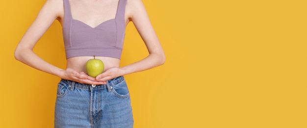 Close up  woman holding apple