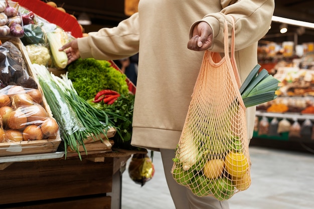 Close up woman holding bag