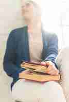 Free photo close-up of a woman holding book