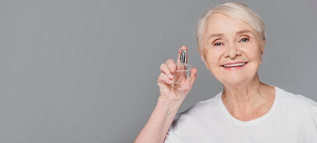 Close-up woman holding bottle