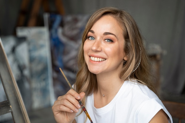 Close up woman holding brush