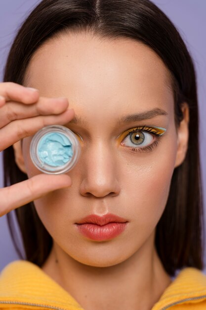 Close up woman holding container