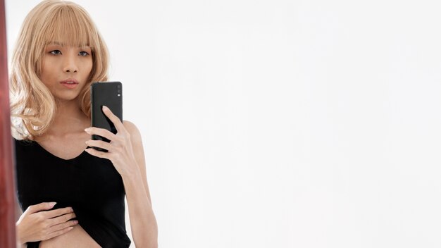 Close up woman holding device