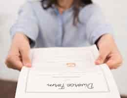 Free photo close-up woman holding divorce form