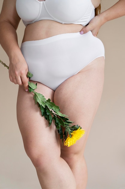 Close up woman holding flower