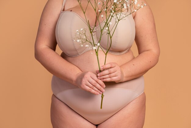 Close up woman holding flowers