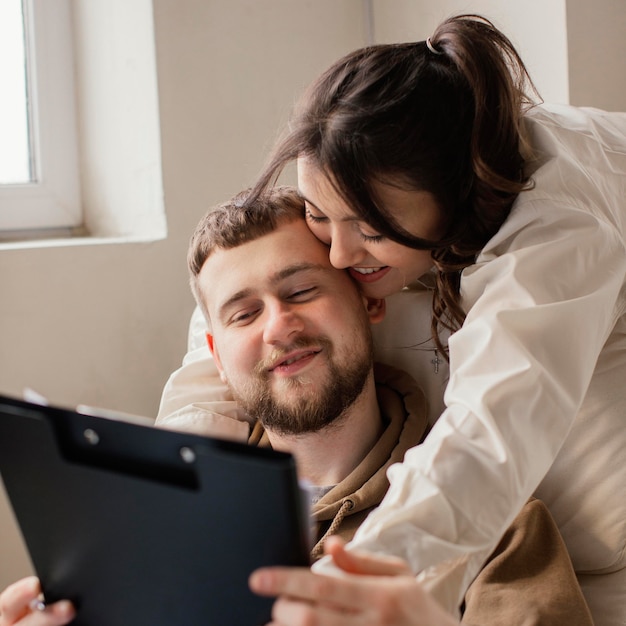 Close up woman holding man