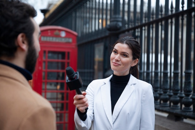 Close up woman holding microphone