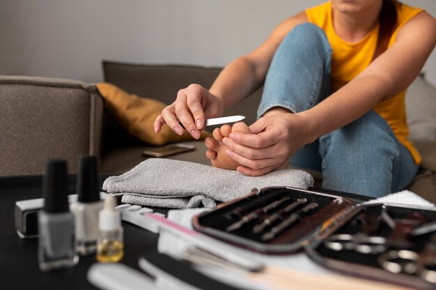 Close up woman holding nail file