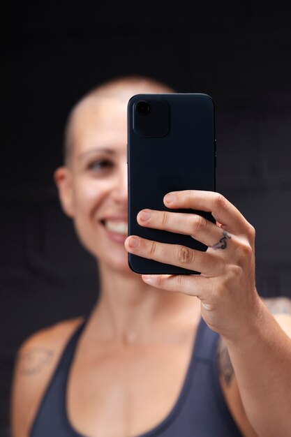 Close up woman holding smartphone