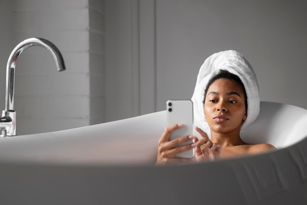 Close up woman holding smartphone