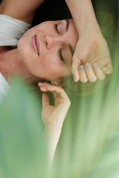 Relax and Unwind with a Close-up of a Woman and a House Plant – Free Stock Photo