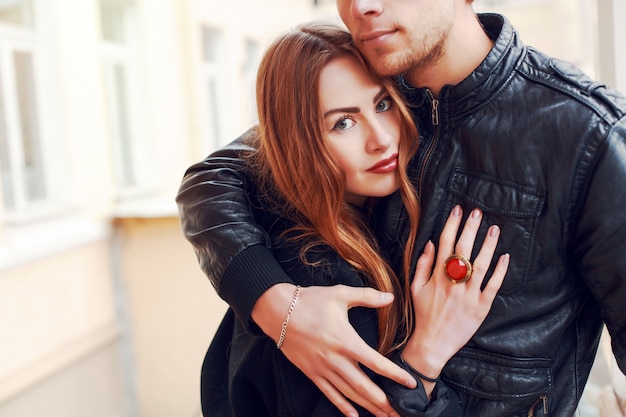 Close-up of woman hugging her partner