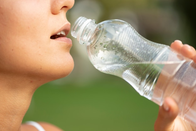 Close-up woman hydrating