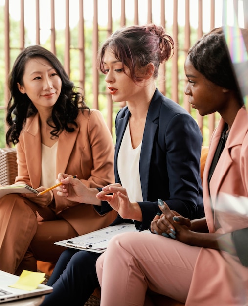 Close-up woman leading team meeting