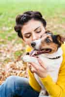 Free photo close-up woman in love with her pet