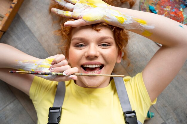 close up woman posing with brush