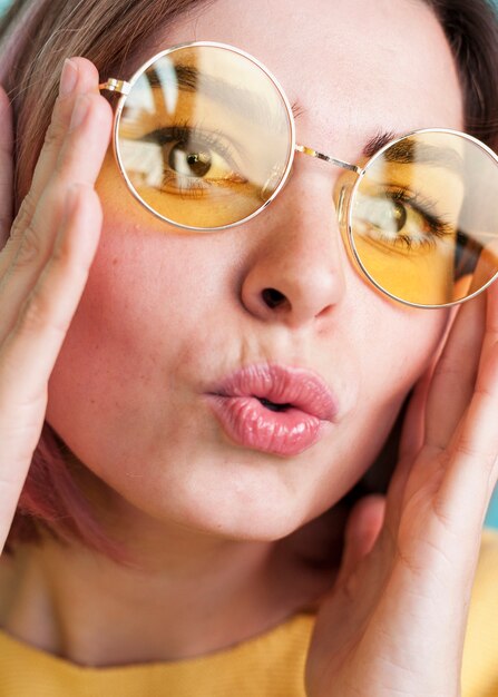 Close up of woman puckering lips