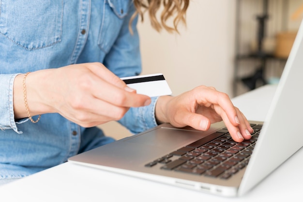 Close-up woman ready to shop online