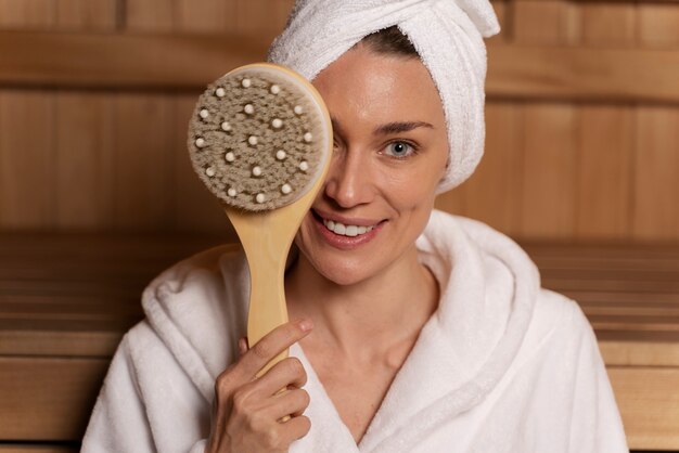 Close up on woman relaxing in the sauna