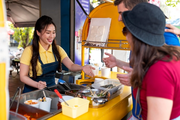 Free photo close up woman serving customers