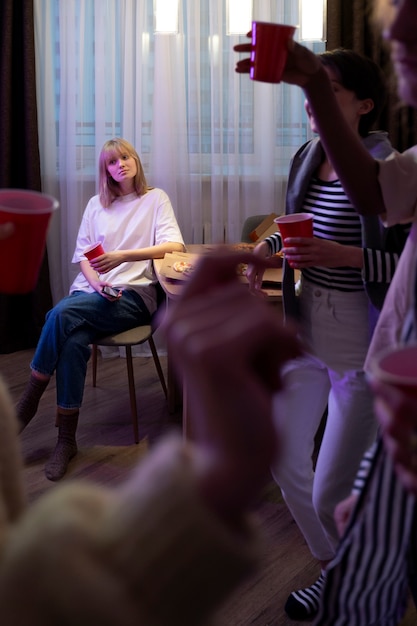 Close up woman sitting alone at party