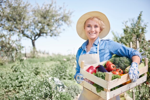 Close up on woman taking care of her garden