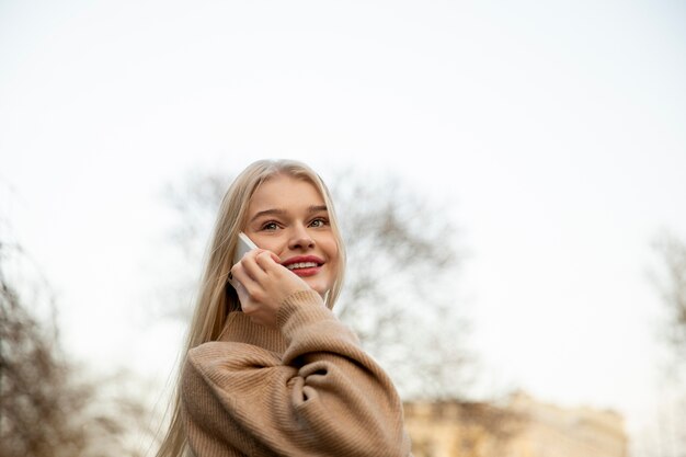 Close up woman talking on phone