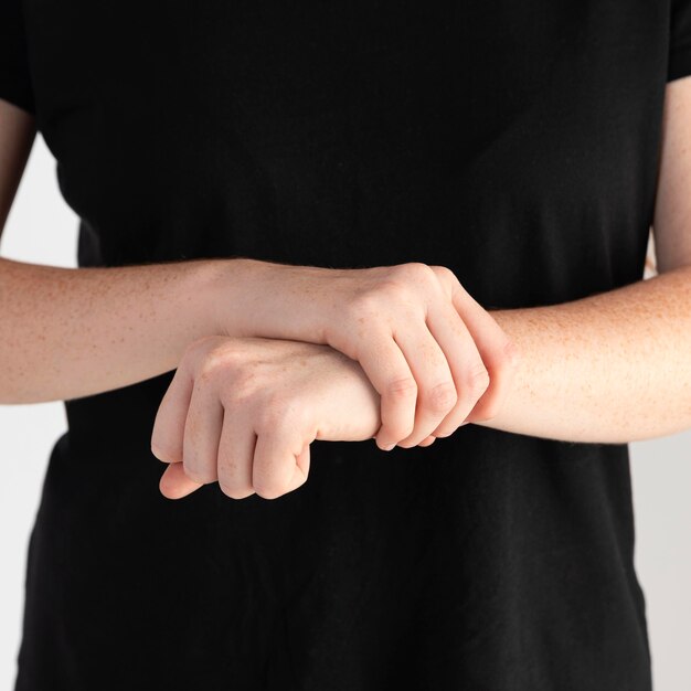 Close-up woman teaching sign language